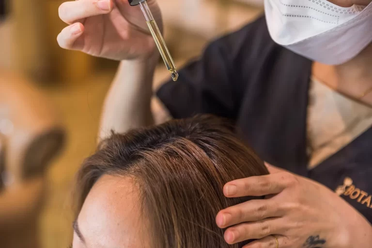 Hair Treatment Specialist Providing Dandruff Treatment